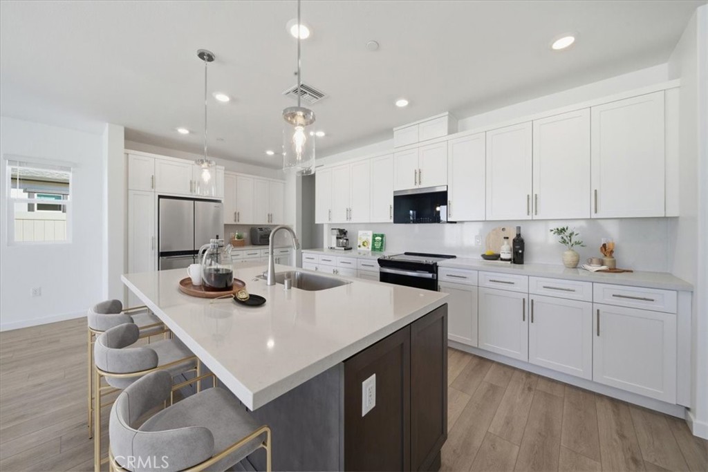 44273 Homestead Street Lancaster, CA 93535 - Photo 4 of 28 PHOTOS ARE OF MODEL MATCH AND HAVE BEEN VIRTUALLY STAGED - EXTERIOR AND INTERIOR FINISHES MAY VARY