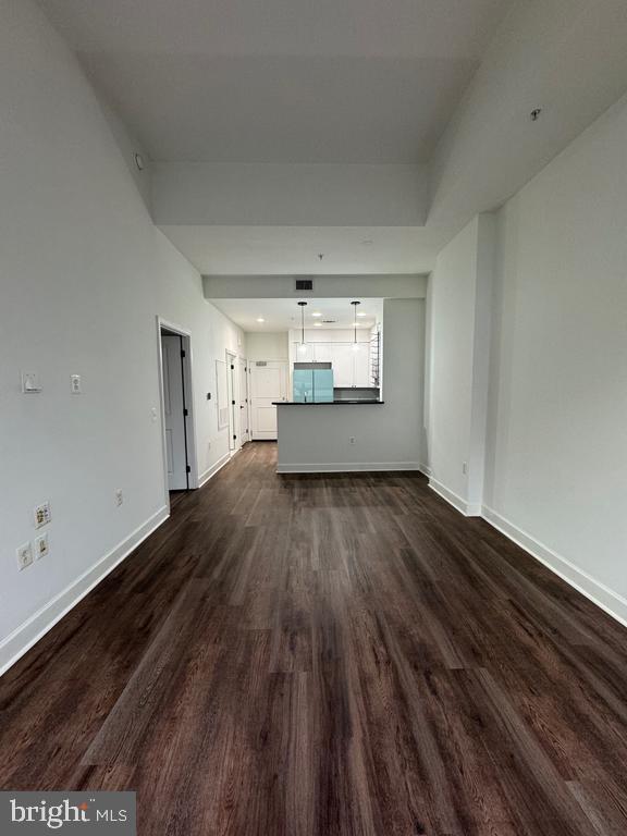 3650 South Glebe Road, Unit 147 Arlington, VA 22202 - Photo 5 of 31 a view of empty room with wooden floor
