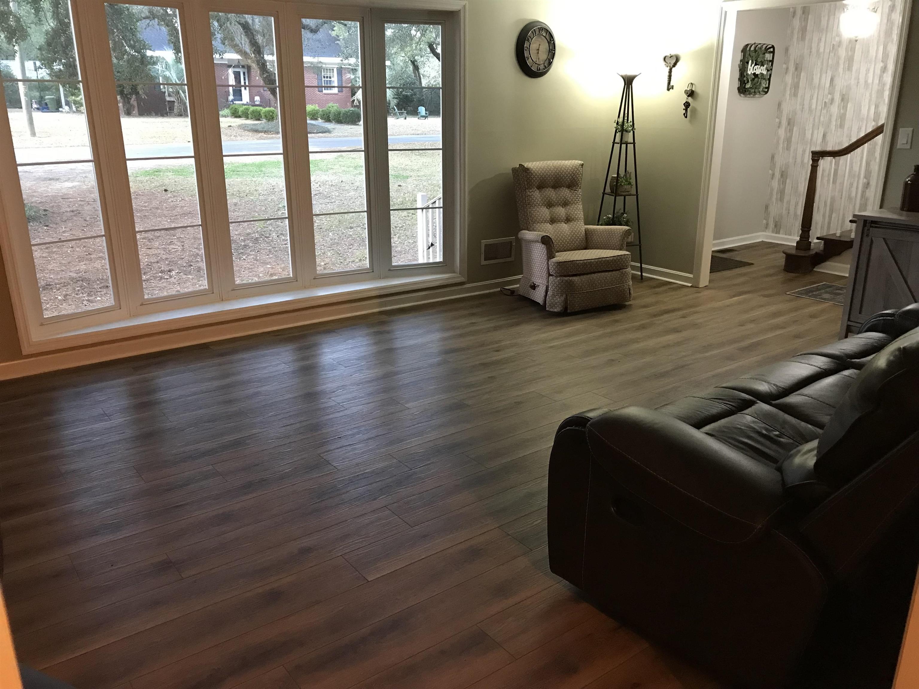 1201 Landgrave Street Georgetown, SC 29440 - Photo 11 of 38 Living area with dark wood-type flooring and baseboards
