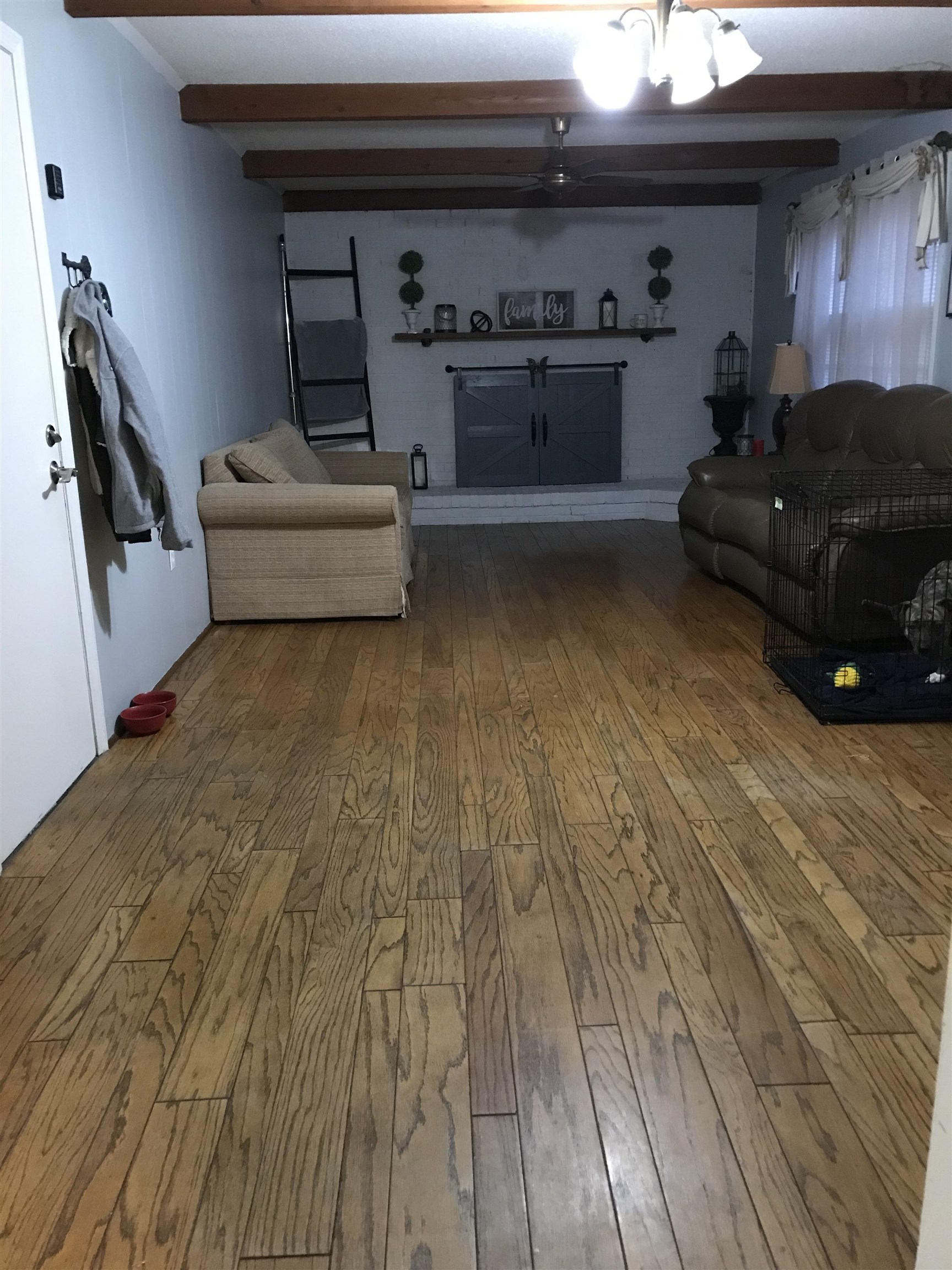 1201 Landgrave Street Georgetown, SC 29440 - Photo 17 of 38 Living area featuring beam ceiling, hardwood / wood-style flooring, and a chandelier