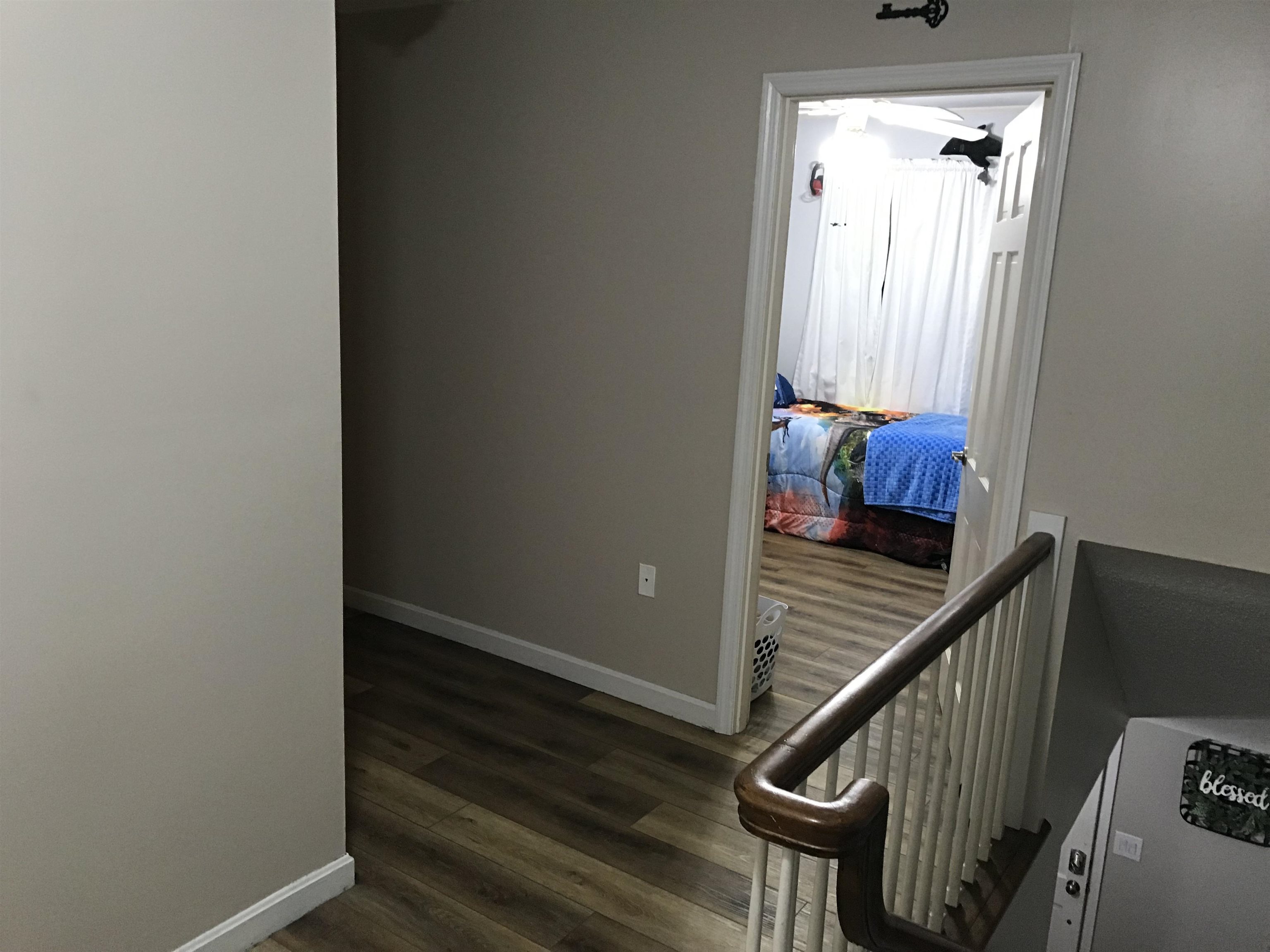 1201 Landgrave Street Georgetown, SC 29440 - Photo 26 of 38 Hall featuring dark wood-style flooring and baseboards