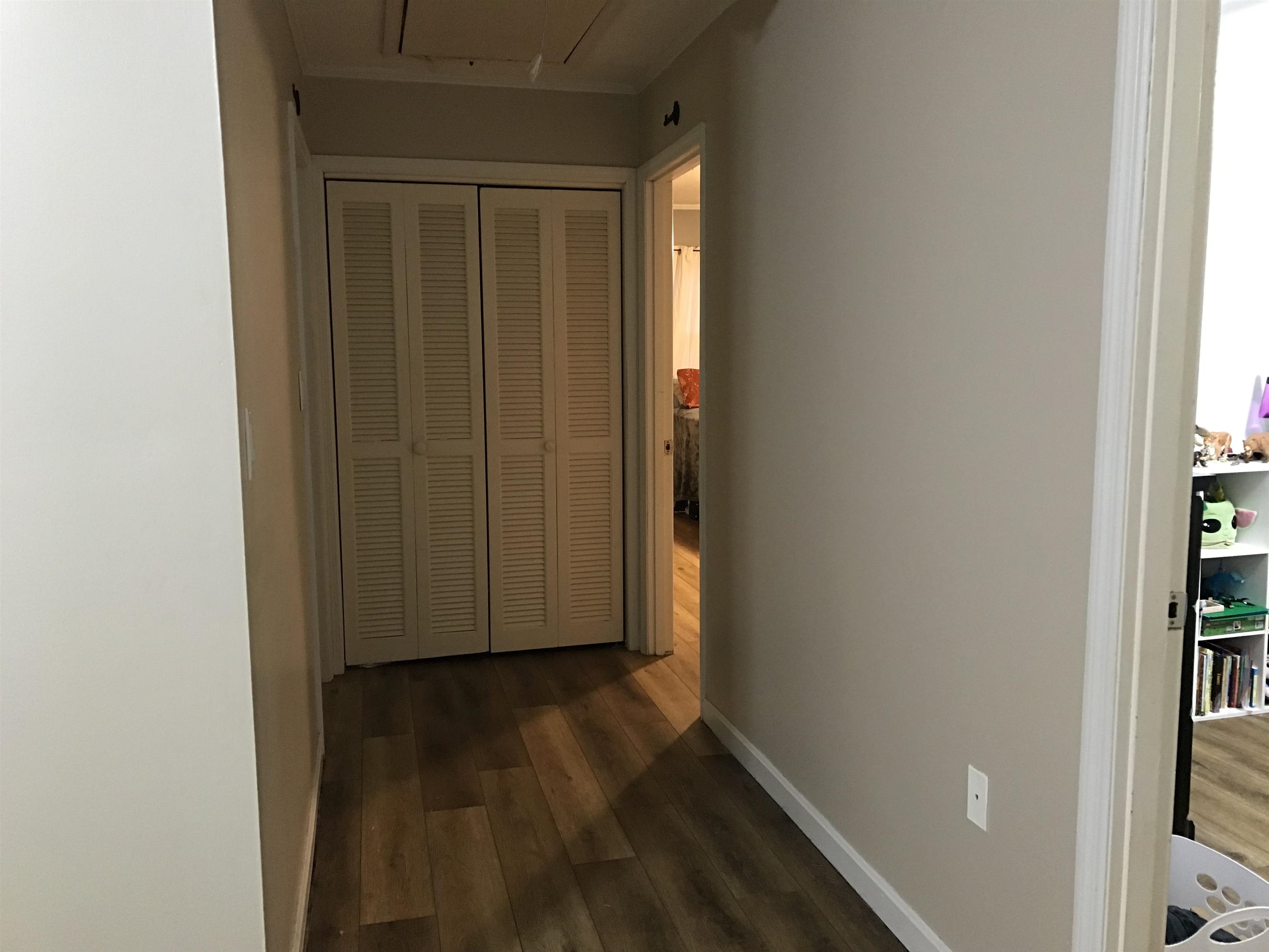 1201 Landgrave Street Georgetown, SC 29440 - Photo 28 of 38 Corridor featuring dark wood finished floors