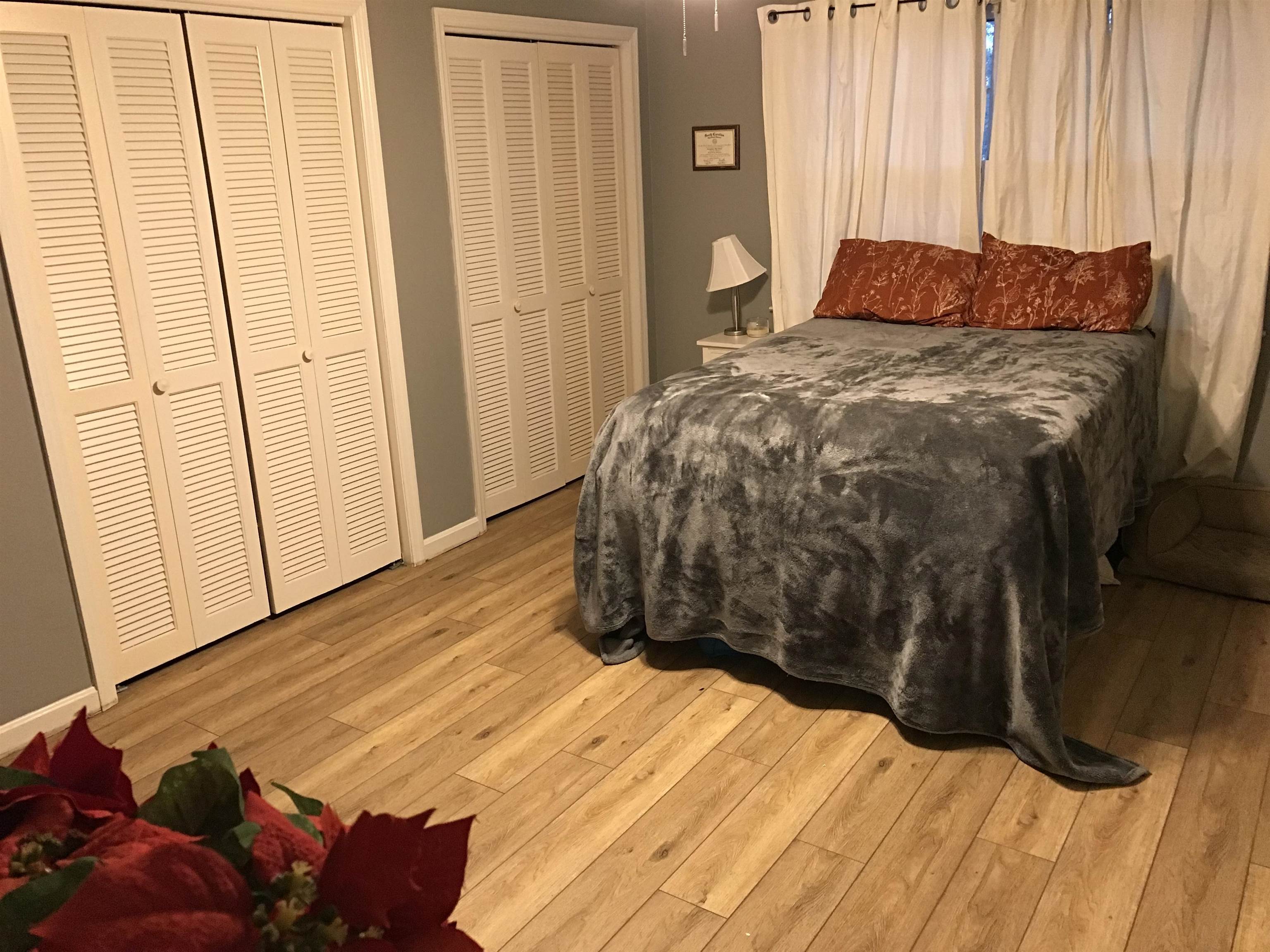 1201 Landgrave Street Georgetown, SC 29440 - Photo 32 of 38 Bedroom featuring two closets and light wood finished floors