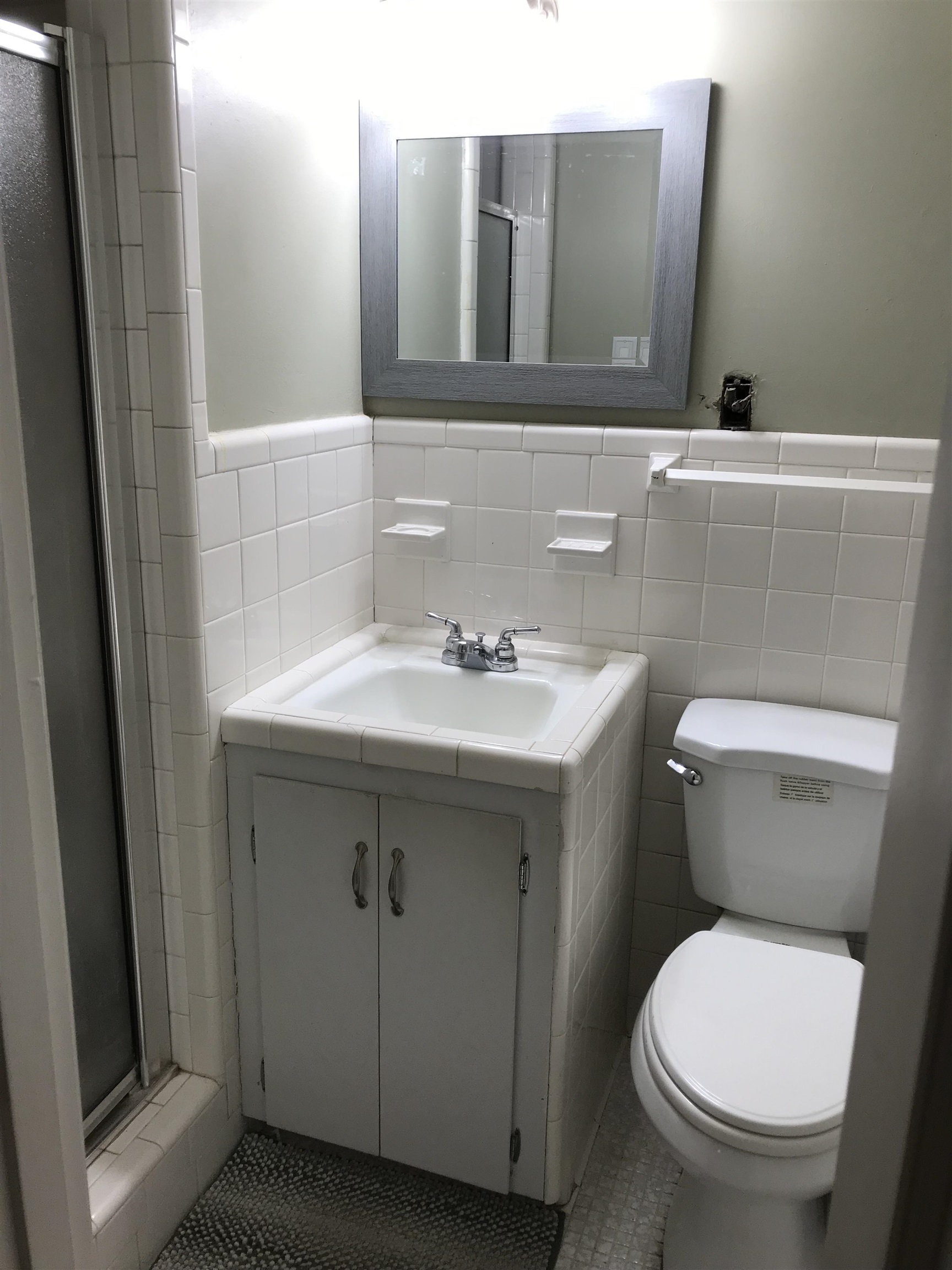 1201 Landgrave Street Georgetown, SC 29440 - Photo 38 of 38 Full bathroom with a shower stall, vanity, tile walls, and tile patterned flooring
