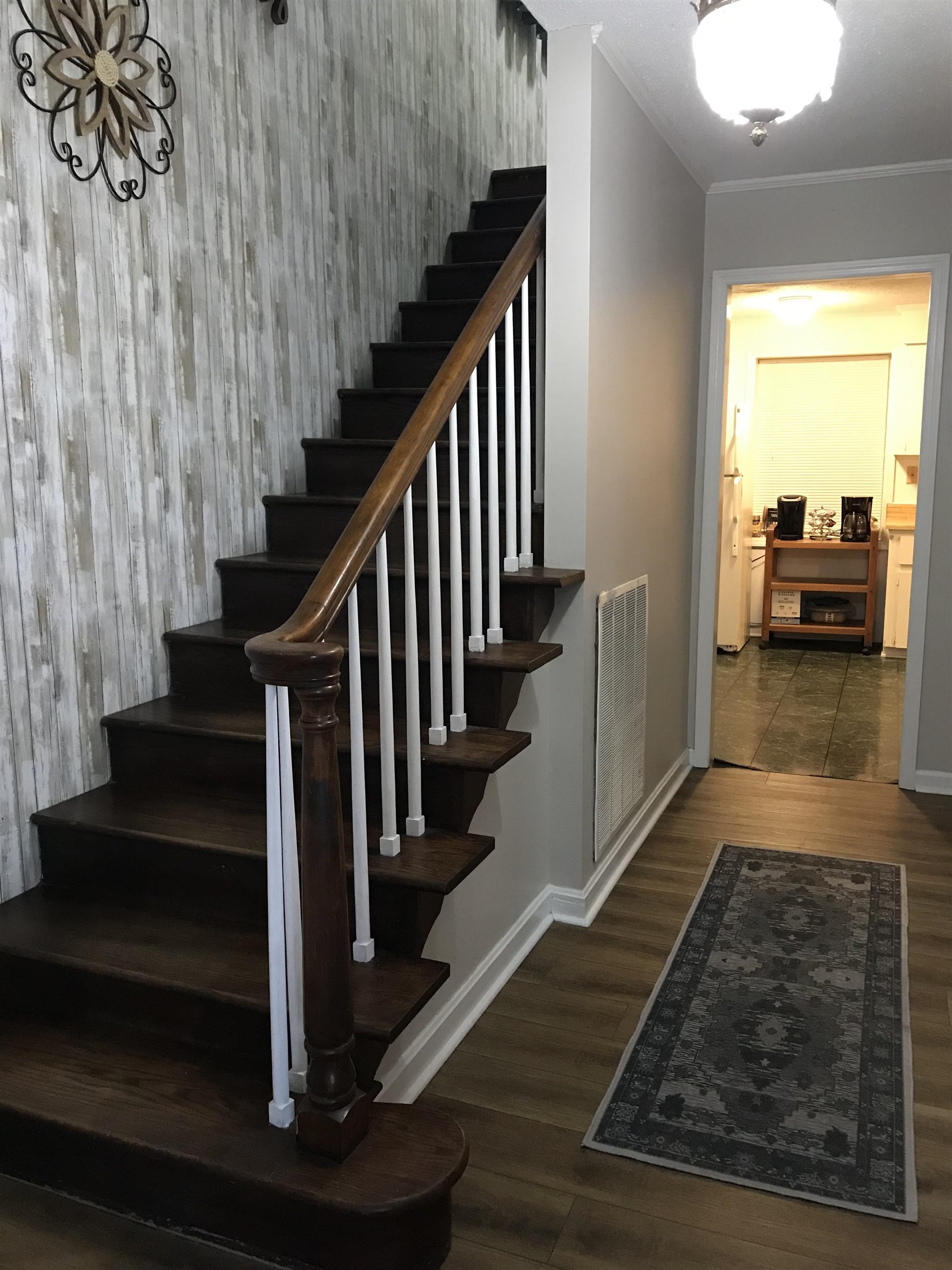 1201 Landgrave Street Georgetown, SC 29440 - Photo 8 of 38 Stairway featuring wood finished floors and baseboards