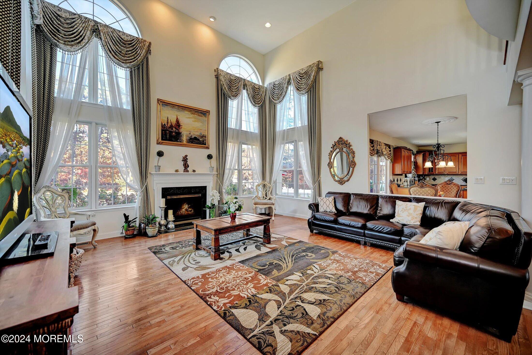 25 Wilson Boulevard Jackson, NJ 08527 - Photo 13 of 61 a living room with furniture fireplace and a large window