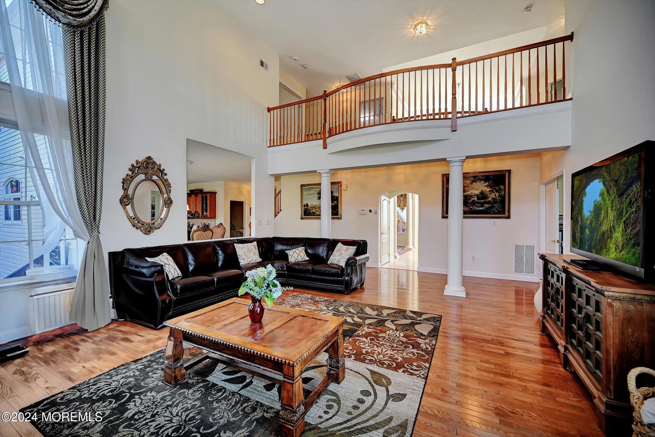 25 Wilson Boulevard Jackson, NJ 08527 - Photo 14 of 61 a living room with furniture a flat screen tv and a window