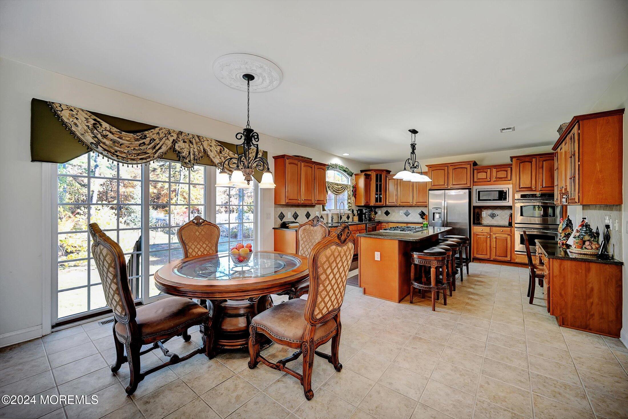 25 Wilson Boulevard Jackson, NJ 08527 - Photo 18 of 61 a view of a dining room with furniture