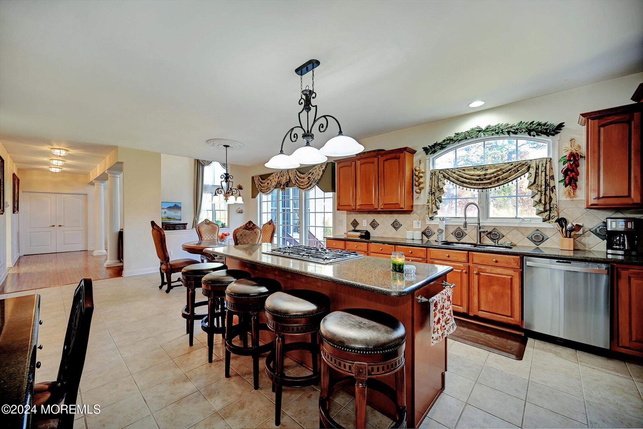 25 Wilson Boulevard Jackson, NJ 08527 - Photo 20 of 61 a large kitchen with a table and chairs