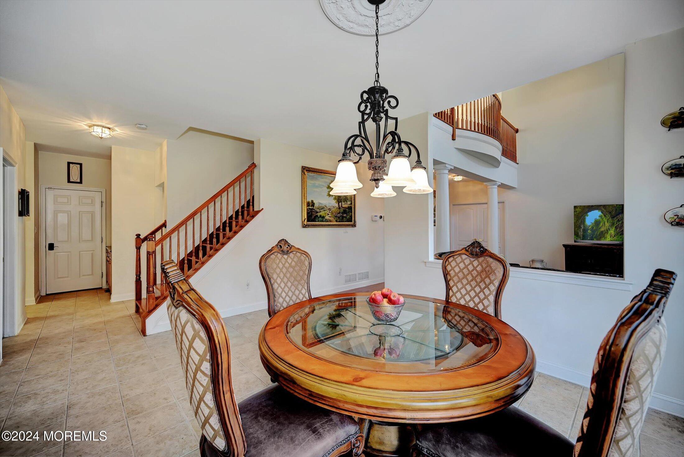 25 Wilson Boulevard Jackson, NJ 08527 - Photo 24 of 61 a dining room with furniture and wooden floor
