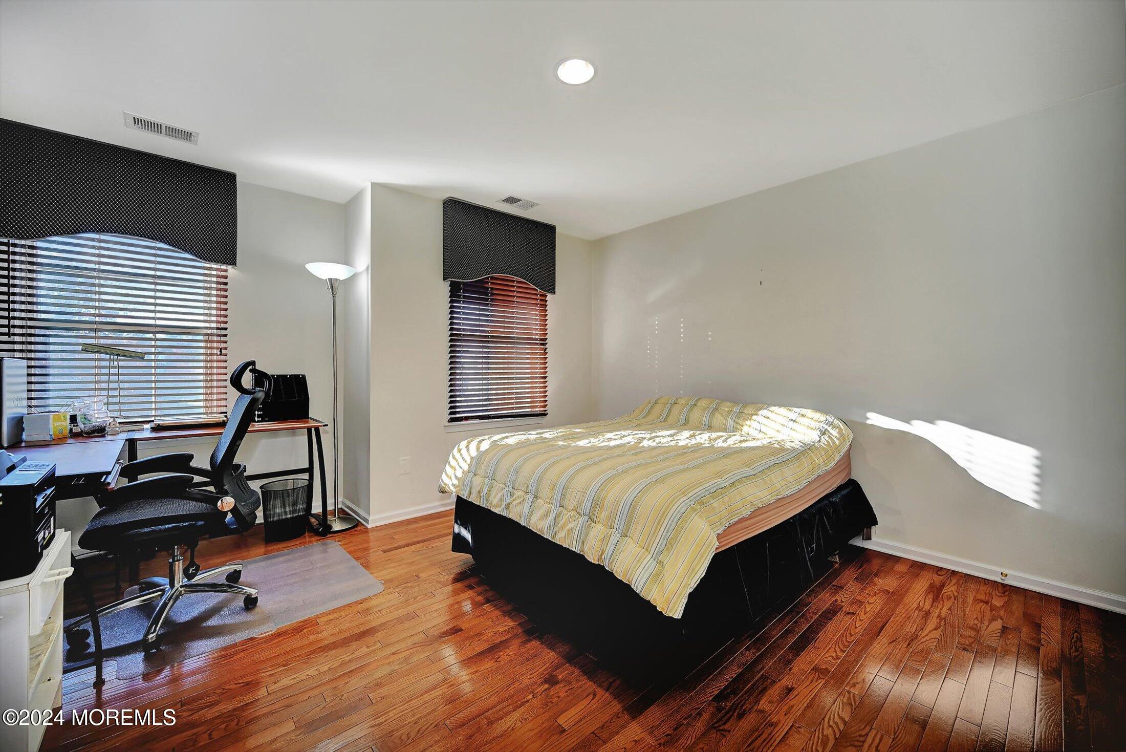 25 Wilson Boulevard Jackson, NJ 08527 - Photo 41 of 61 a bedroom with a bed and a desk