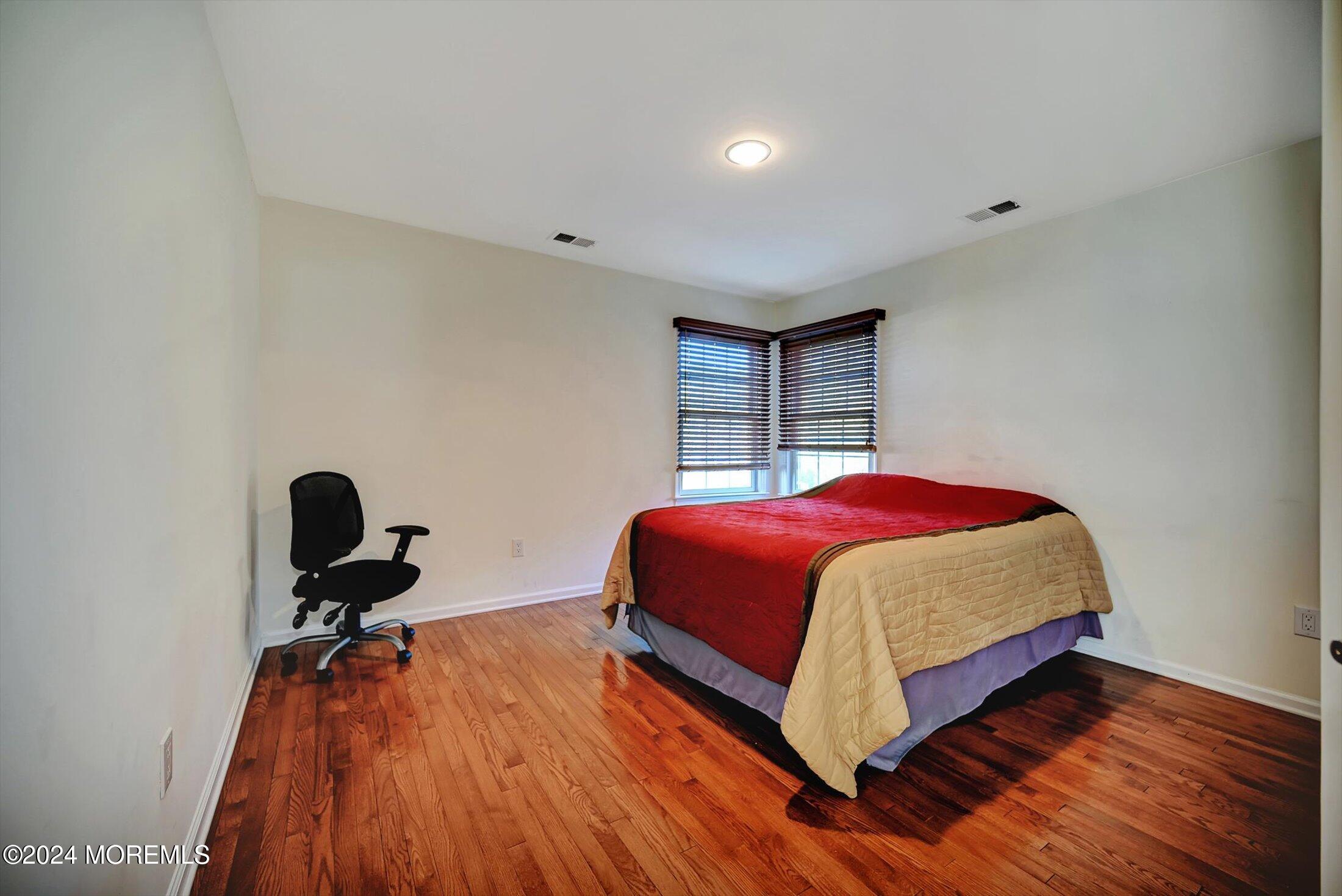 25 Wilson Boulevard Jackson, NJ 08527 - Photo 42 of 61 a bedroom with a bed and a dresser