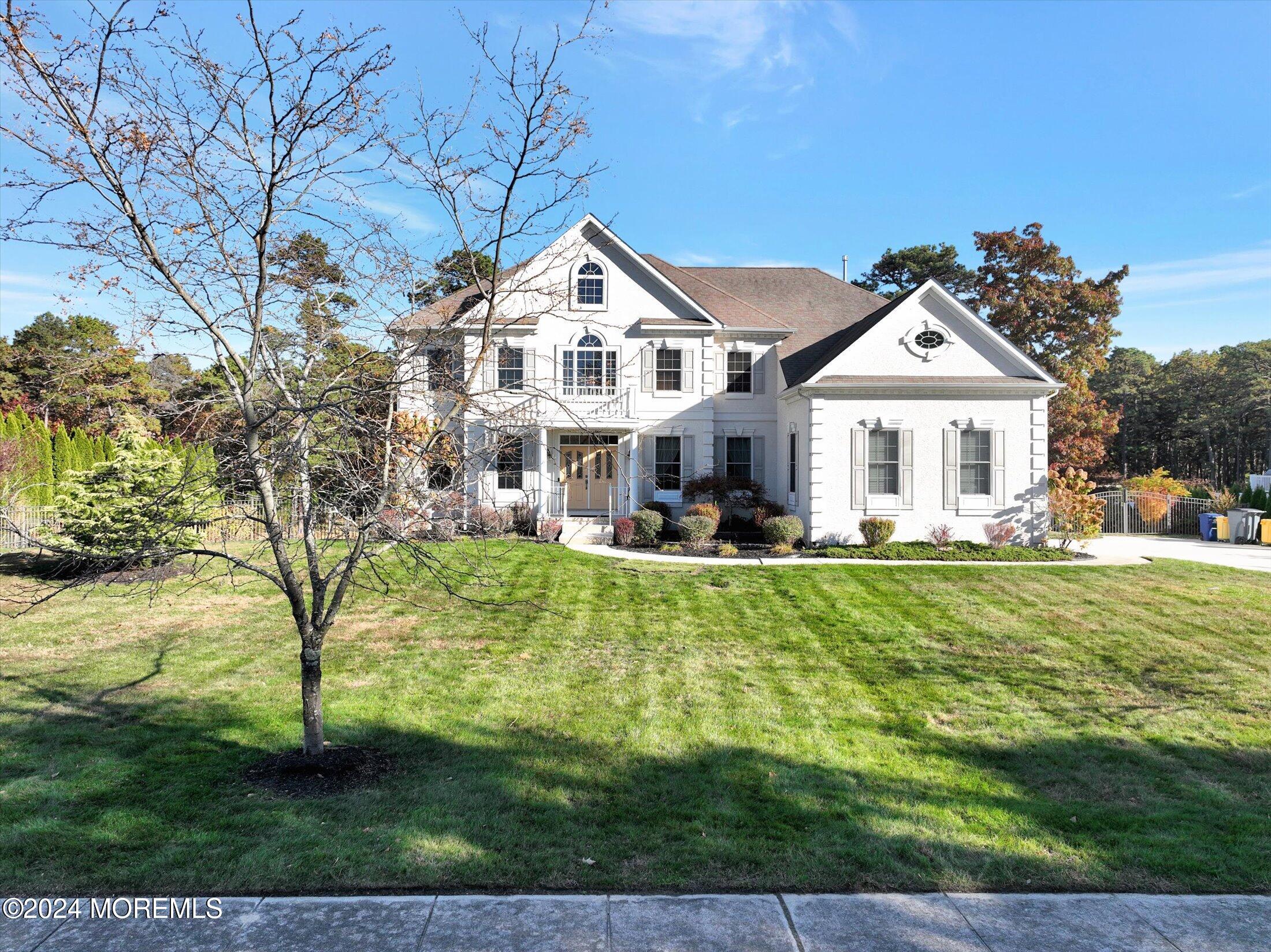 25 Wilson Boulevard Jackson, NJ 08527 - Photo 56 of 61 a front view of a house with a yard