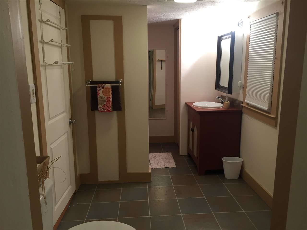 558 Battlefield Road New Hope, VA 24437 - Photo 18 of 21 a bathroom with a sink and a mirror