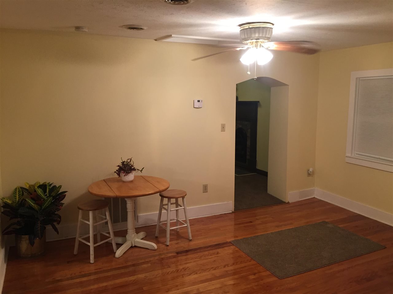 558 Battlefield Road New Hope, VA 24437 - Photo 8 of 21 a view of a room with wooden floor and chandelier fan