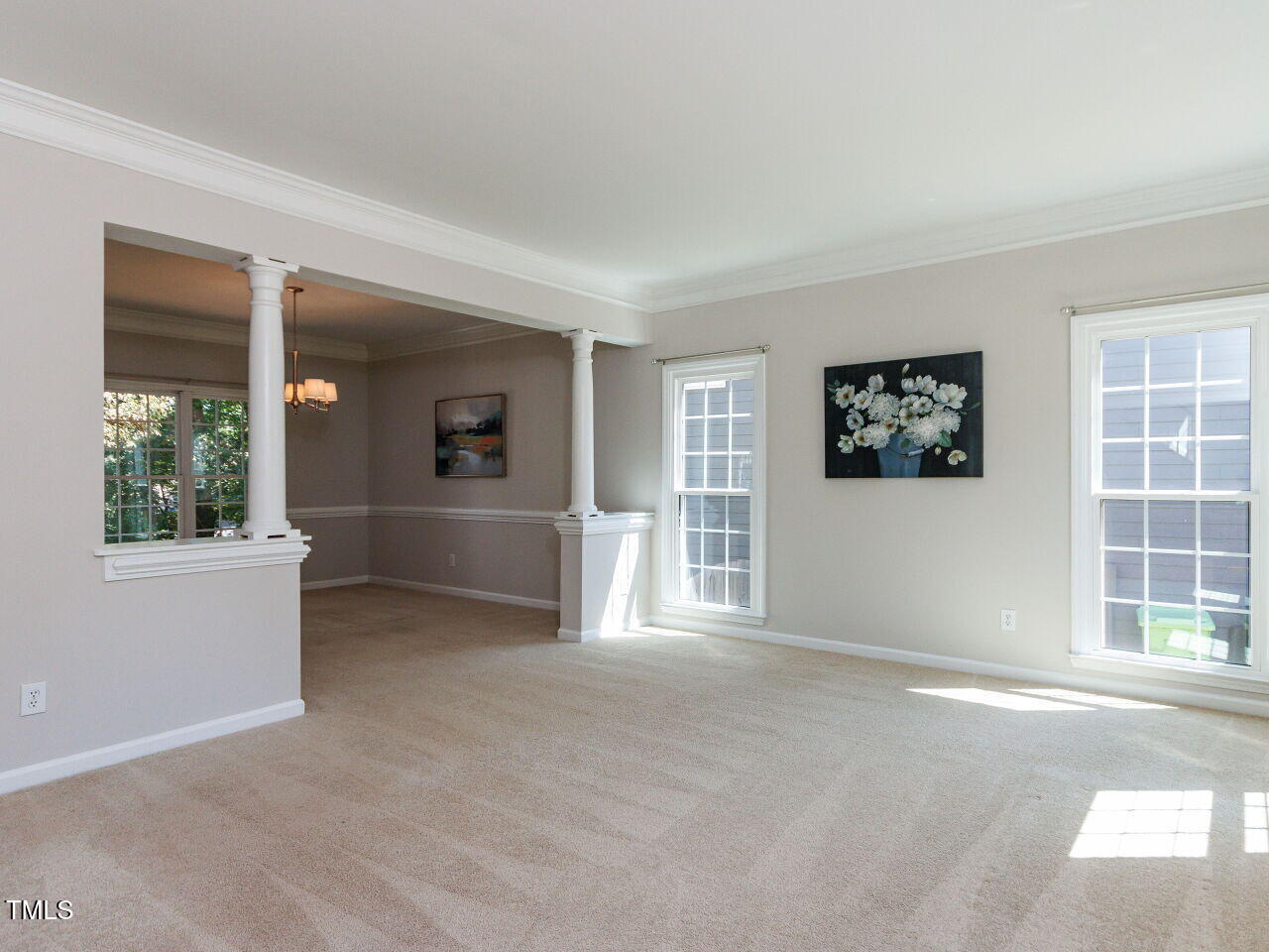6516 Englehardt Drive Raleigh, NC 27617 - Photo 12 of 43 Large open Living and Dining Area. New windows.