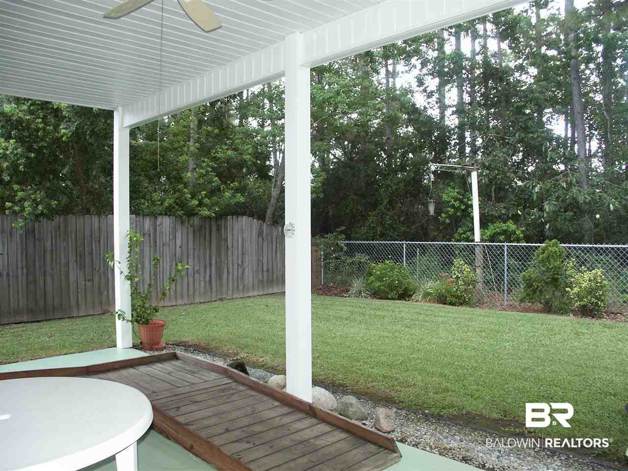1197 Ridgewood Drive Lillian, AL 36549 - Photo 11 of 21 Back Yard Covered Porch