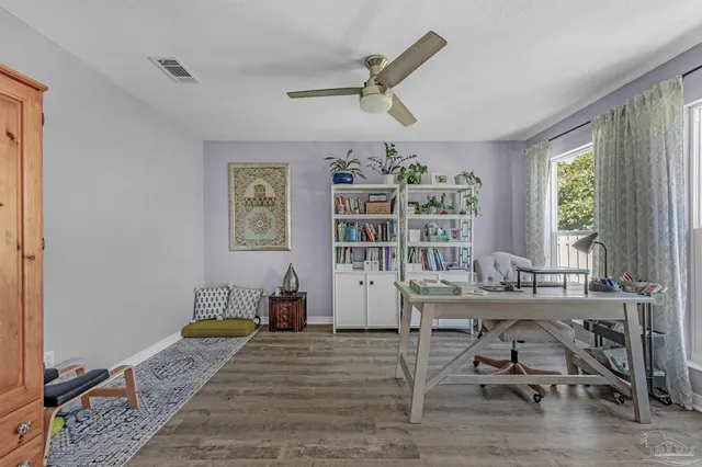 a bathroom with a sink toilet and a mirror