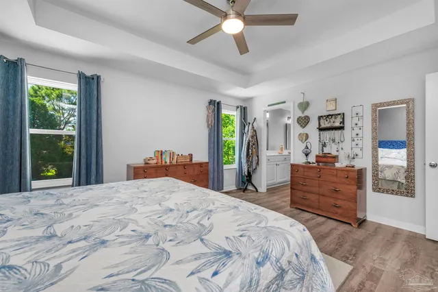 a bathroom with a double vanity sink and mirror