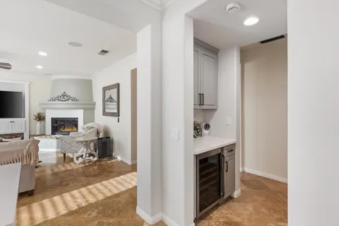 a spacious bedroom with a bed and a fireplace