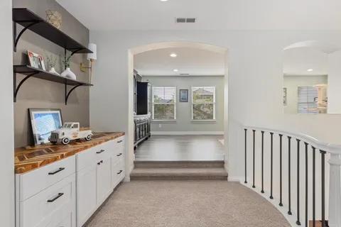 a view of a swimming pool with lounge chair