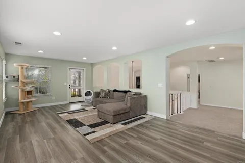 a front view of house with yard and outdoor seating