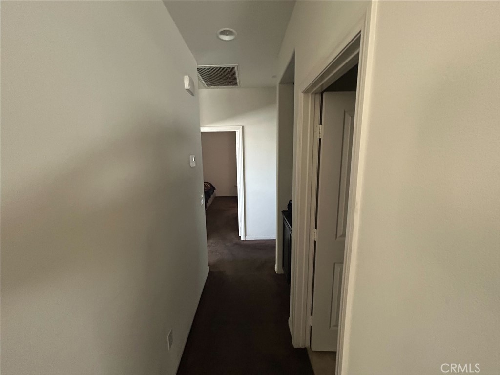772 St Alban Road San Jacinto, CA 92583 - Photo 15 of 25 a view of a hallway