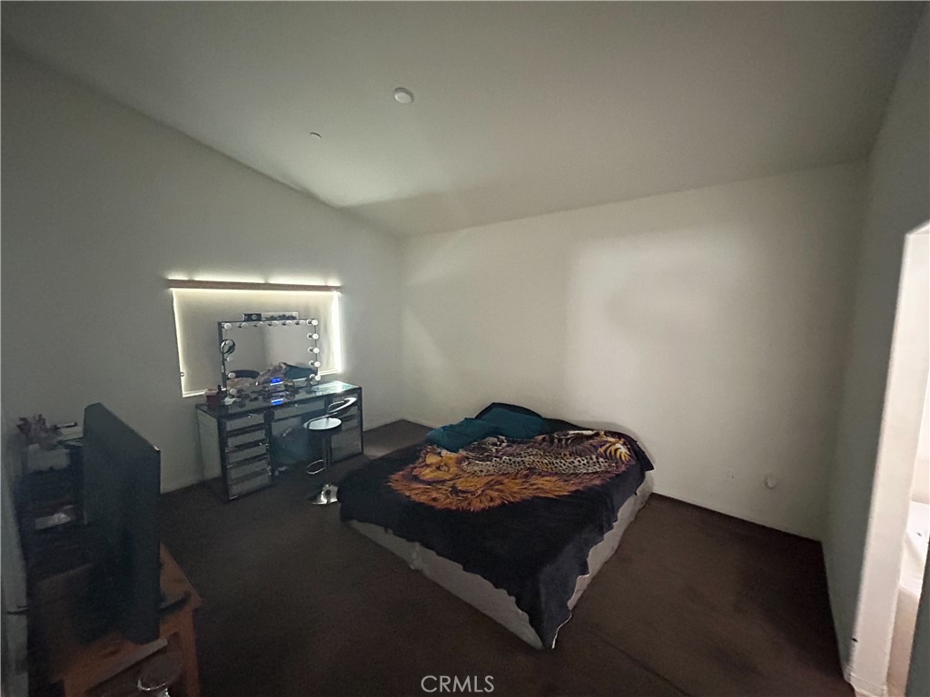 772 St Alban Road San Jacinto, CA 92583 - Photo 17 of 25 a bed sitting in a room next to a window