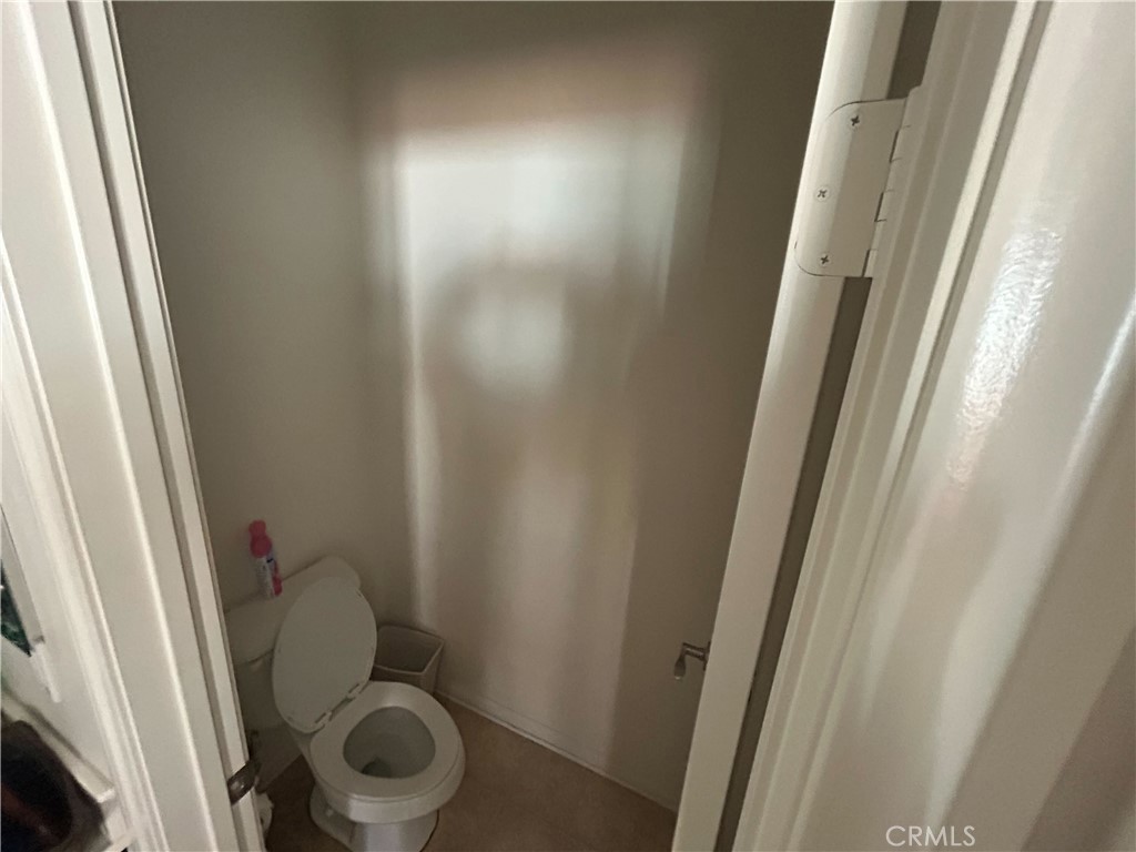 772 St Alban Road San Jacinto, CA 92583 - Photo 20 of 25 a bathroom with a sink and toilet