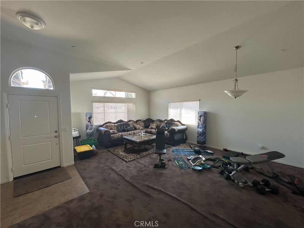 772 St Alban Road San Jacinto, CA 92583 - Photo 7 of 25 a living room with lots of furniture