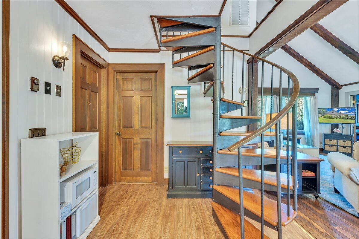 280 Woodwinds Road Callaway, VA 24067 - Photo 20 of 97 a view of an entryway with wooden floor and stairs