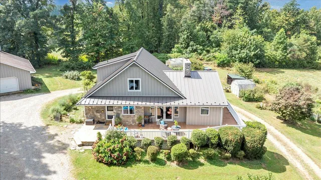 a front view of a house with swimming pool