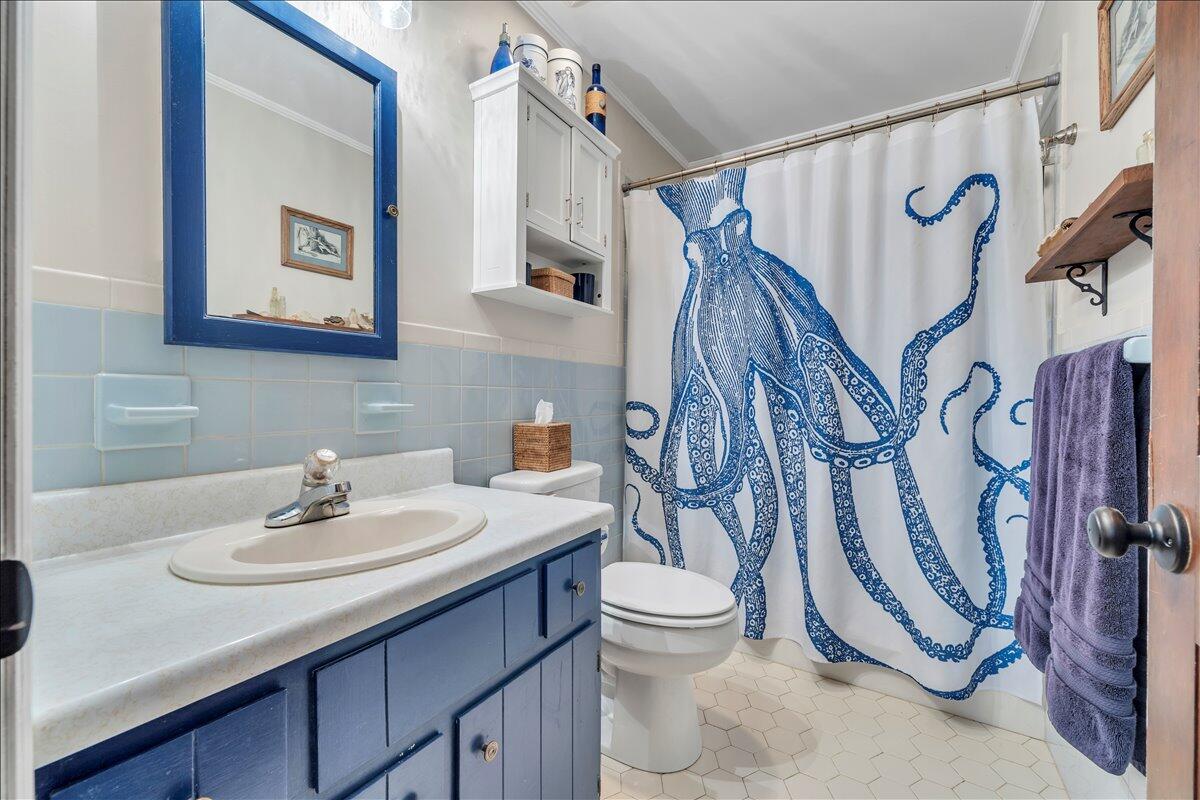 280 Woodwinds Road Callaway, VA 24067 - Photo 21 of 97 a bathroom with a sink toilet and shower