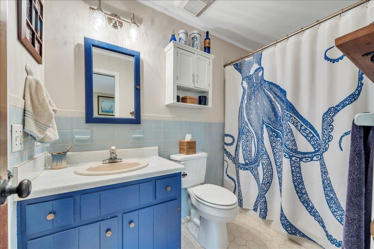 280 Woodwinds Road Callaway, VA 24067 - Photo 22 of 97 a bathroom with a sink vanity mirror and toilet