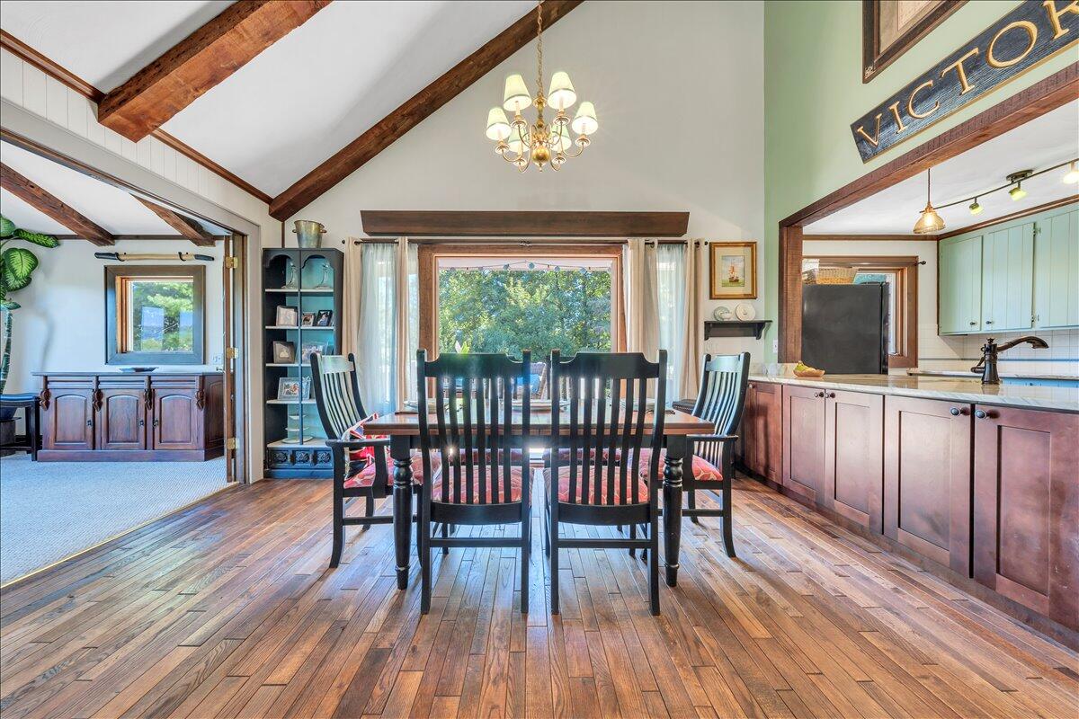280 Woodwinds Road Callaway, VA 24067 - Photo 23 of 97 a view of a dining room with furniture window and wooden floor