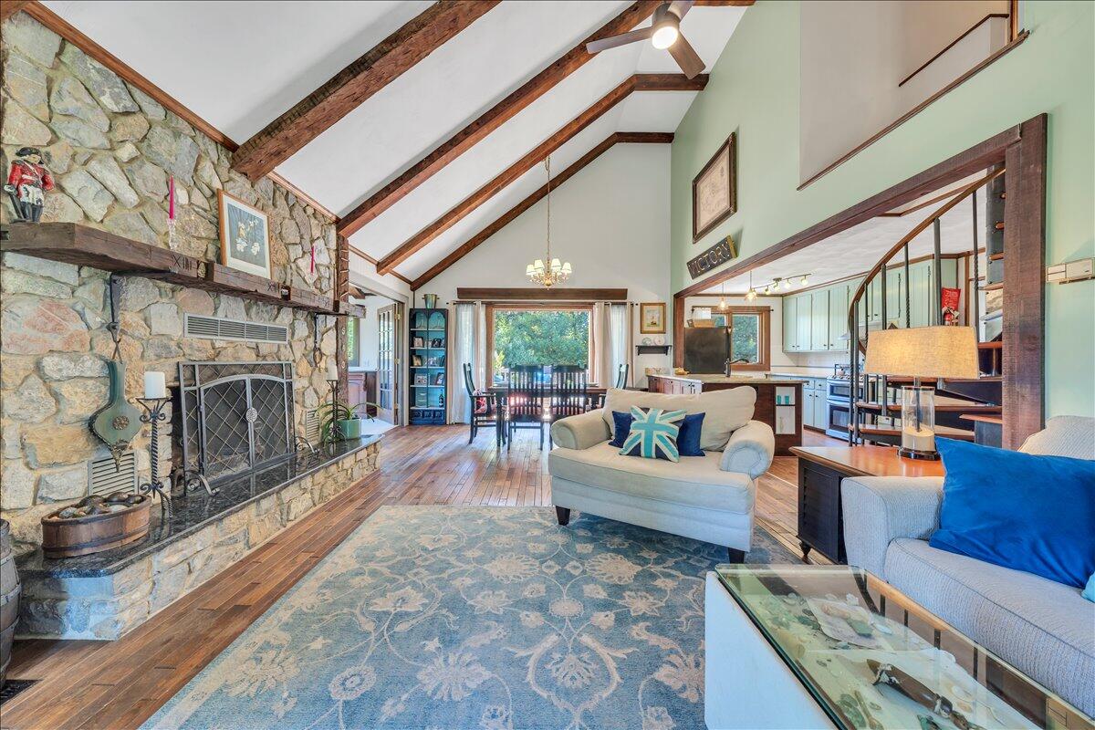 280 Woodwinds Road Callaway, VA 24067 - Photo 29 of 97 a living room with furniture large window and a fireplace