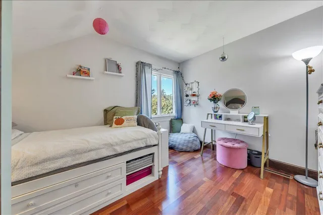 a view of a house with backyard porch and sitting area