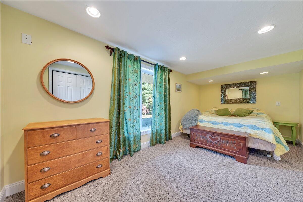 280 Woodwinds Road Callaway, VA 24067 - Photo 51 of 97 a spacious bedroom with a bed and a dresser