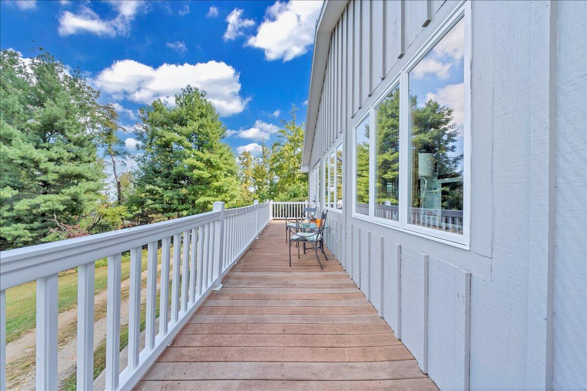 280 Woodwinds Road Callaway, VA 24067 - Photo 55 of 97 a view of a balcony with wooden floor