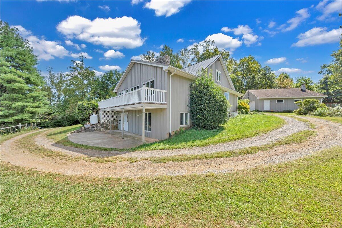 280 Woodwinds Road Callaway, VA 24067 - Photo 60 of 97 a view of a house with a swimming pool