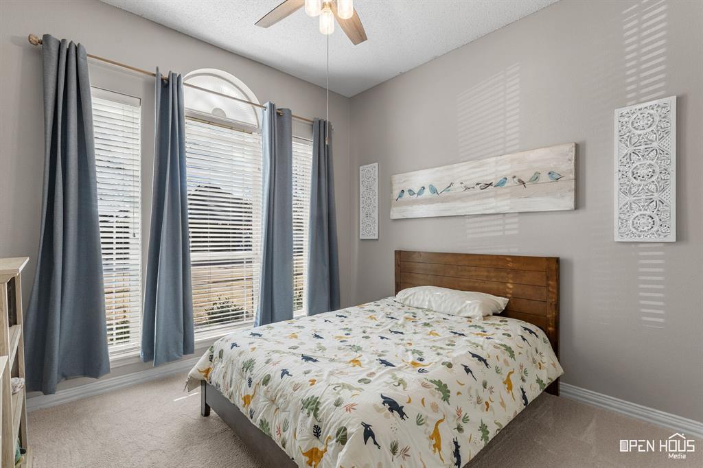 5401 Tanner Drive Wichita Falls, TX 76310 - Photo 21 of 30 a bedroom with a bed and a window