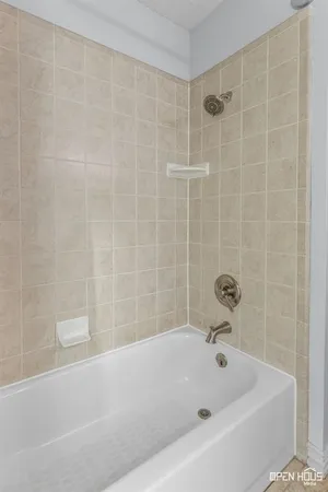 a bathroom with a bathtub