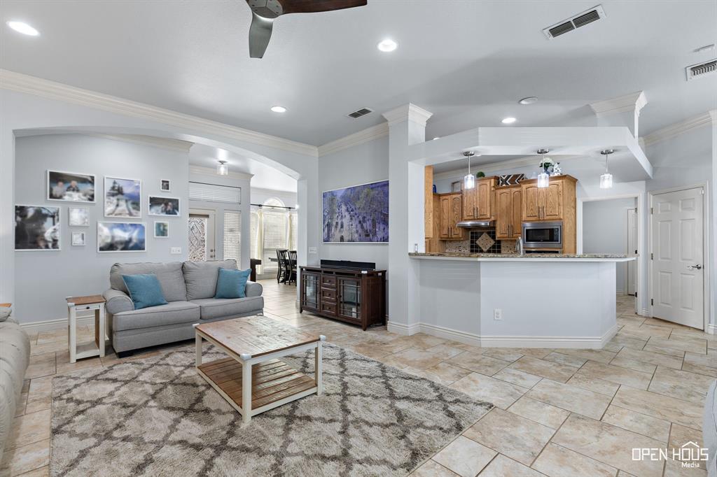 5401 Tanner Drive Wichita Falls, TX 76310 - Photo 9 of 30 a living room with fireplace furniture and a fireplace
