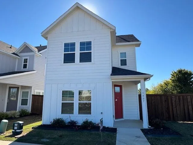 a front view of house with yard