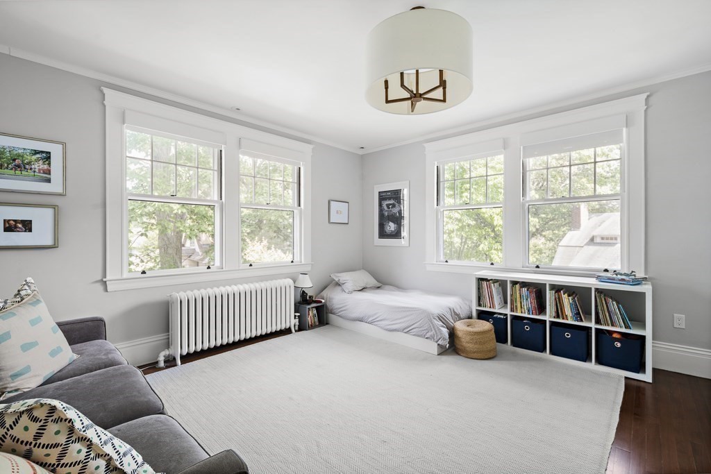64 Williston Road Brookline, MA 02445 - Photo 17 of 29 a living room with furniture and a window