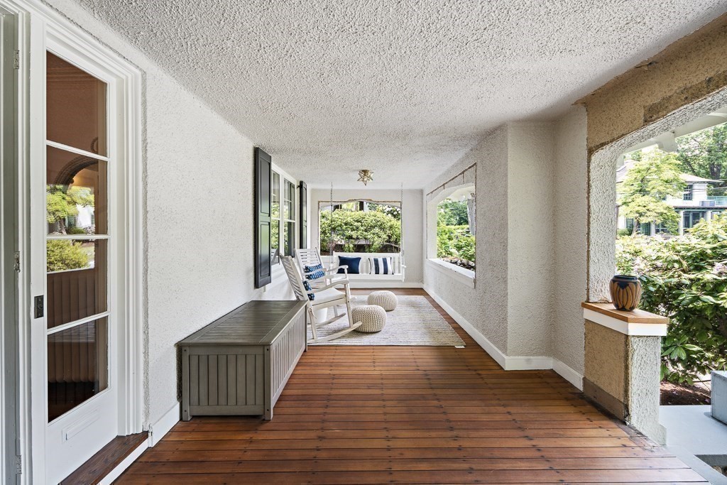 64 Williston Road Brookline, MA 02445 - Photo 26 of 29 a living room with furniture and a large window