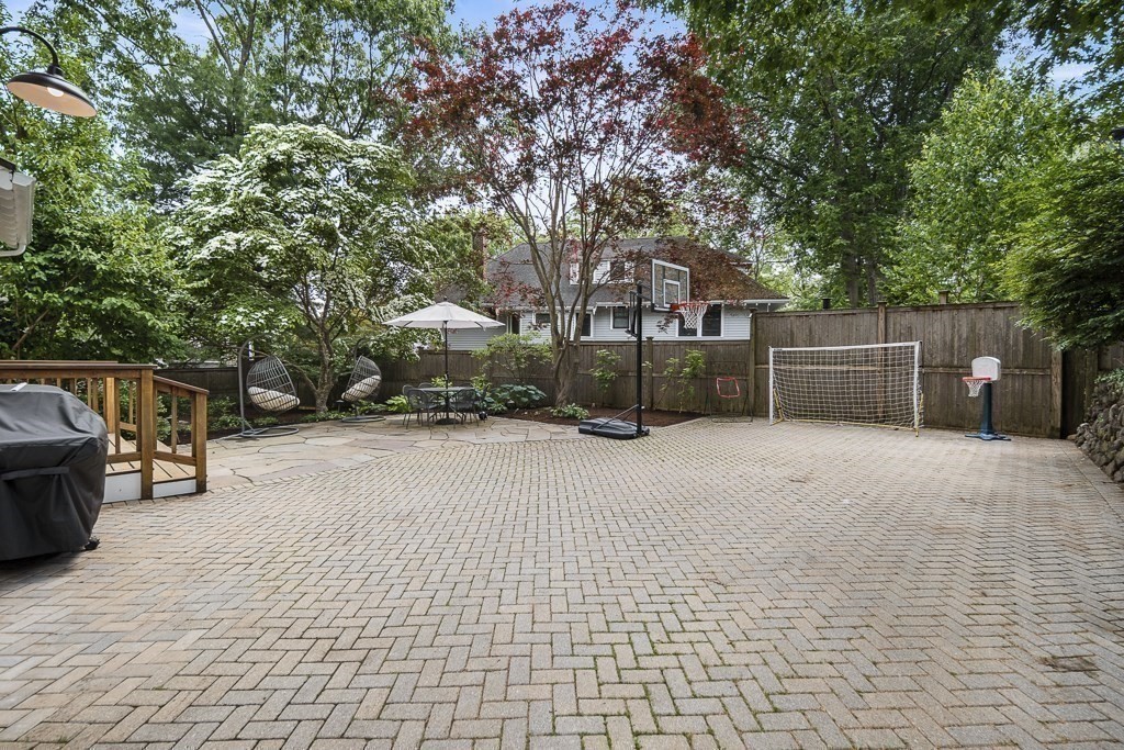 64 Williston Road Brookline, MA 02445 - Photo 28 of 29 a view of a house with a yard