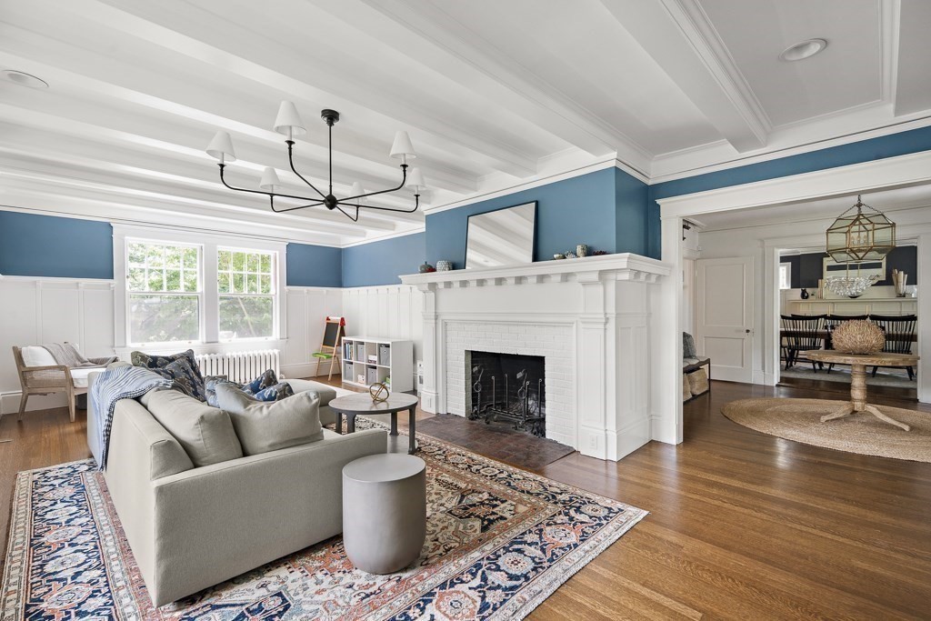 64 Williston Road Brookline, MA 02445 - Photo 3 of 29 a living room with furniture and a fireplace