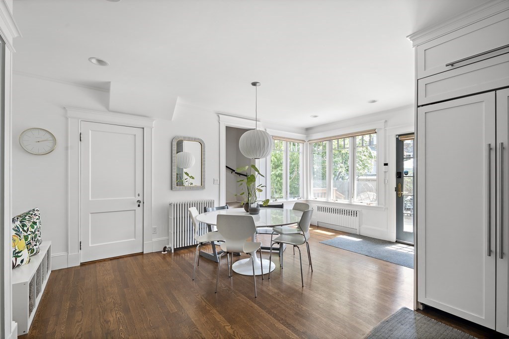 64 Williston Road Brookline, MA 02445 - Photo 8 of 29 a living room with furniture and a large window