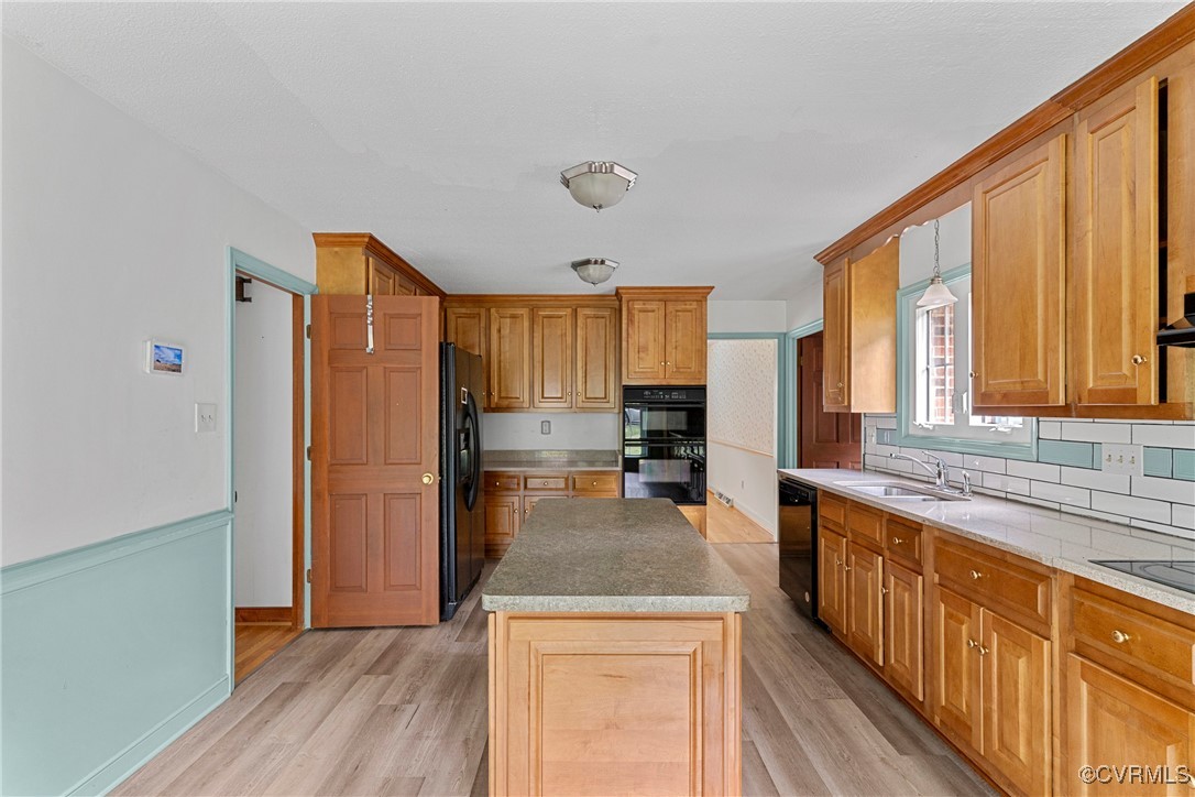 3223 Wood Dale Road Chester, VA 23831 - Photo 14 of 45 Kitchen with black appliances, light wood-style fl